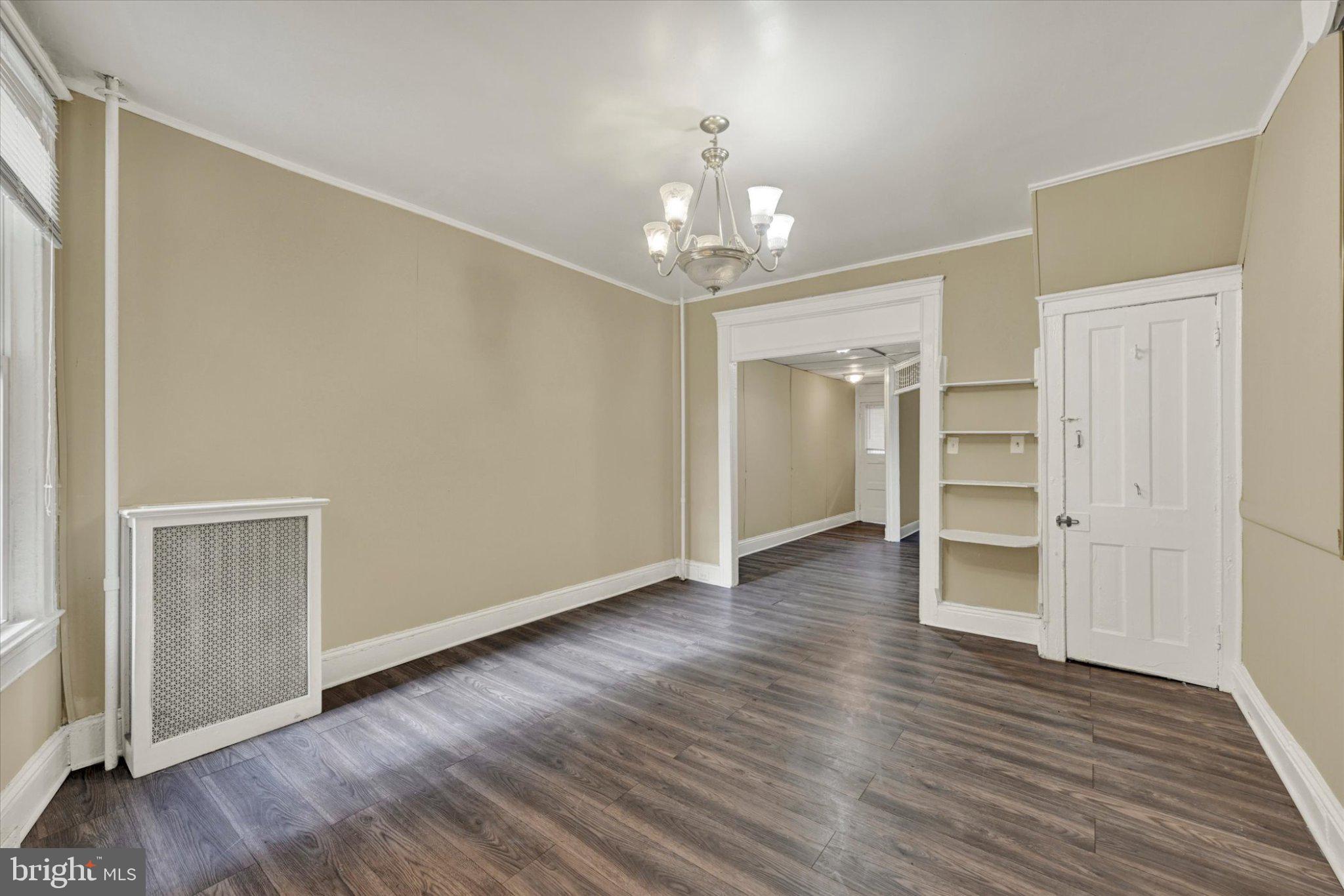 2528 McCulloh Street Baltimore, MD 21217 - Photo 11 of 22 Spacious room with elegant charm.