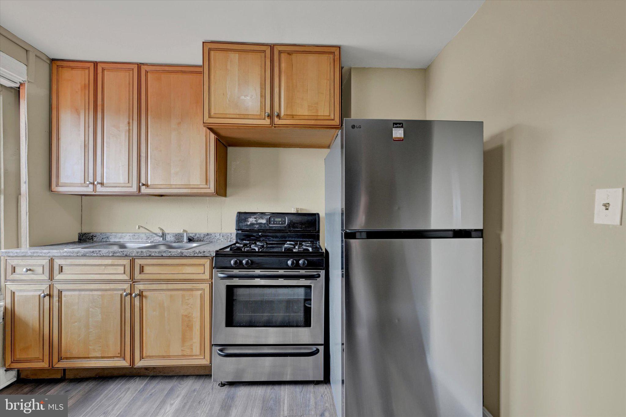 2528 McCulloh Street Baltimore, MD 21217 - Photo 13 of 22 Modern kitchen with sleek appliances.