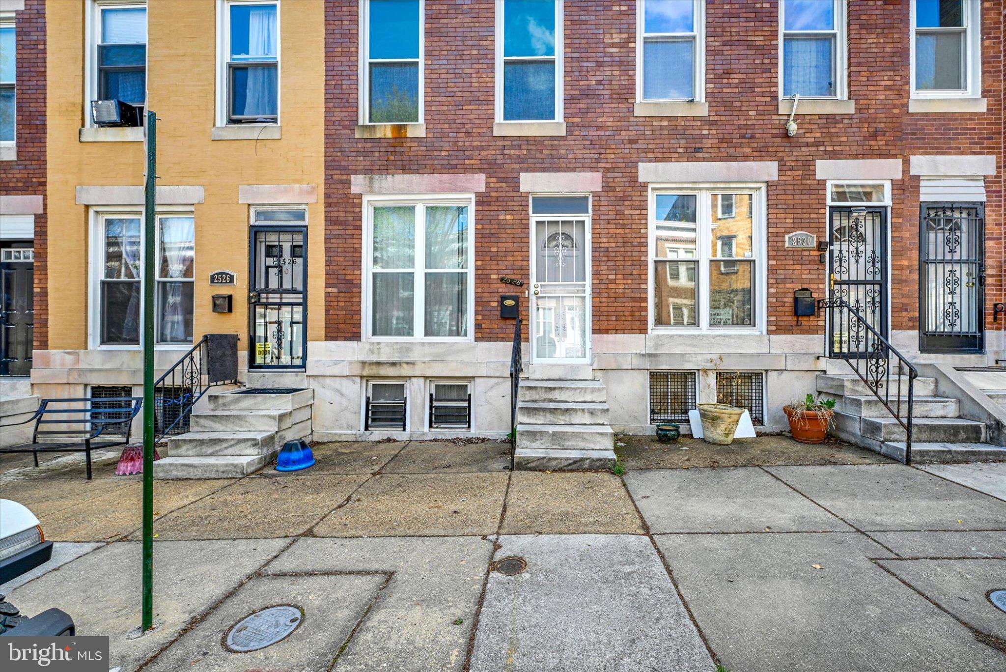 2528 McCulloh Street Baltimore, MD 21217 - Photo 2 of 22 Charming row homes with vibrant facades.