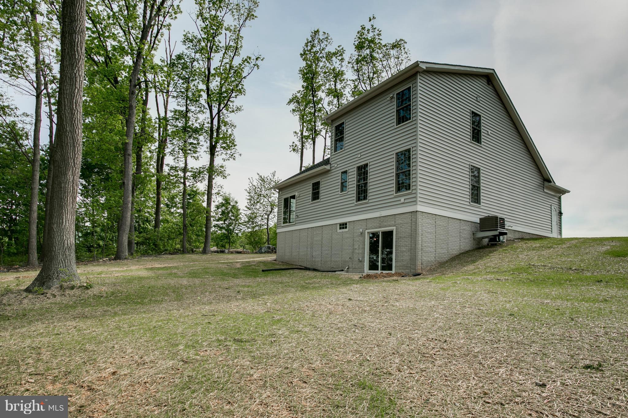 3772 Hooper Road New Windsor, MD 21776 - Photo 4 of 30 a view of a house with a yard
