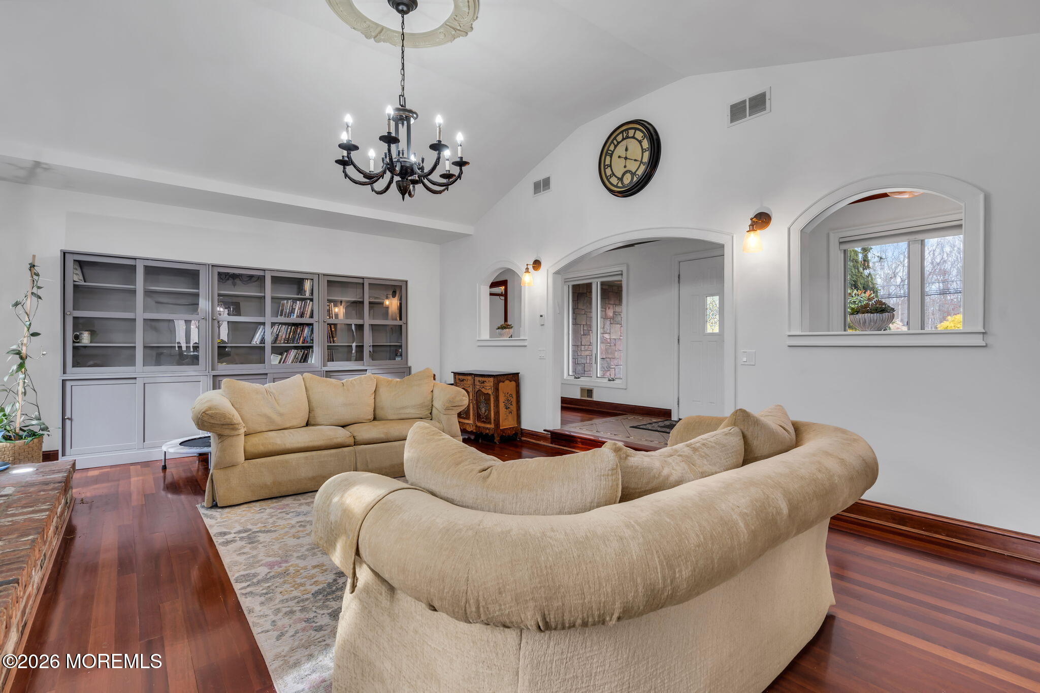 1731 Silverton Road Toms River, NJ 08753 - Photo 12 of 46 a living room with furniture and a chandelier