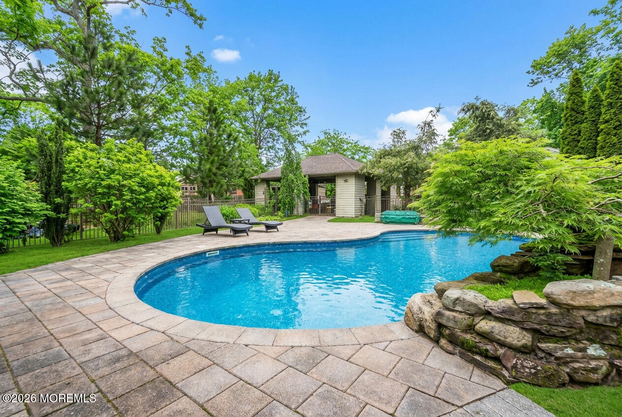 1731 Silverton Road Toms River, NJ 08753 - Photo 2 of 46 a view of a swimming pool with back yard