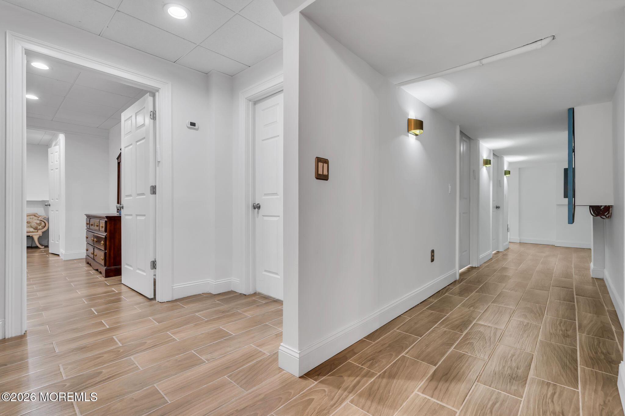 1731 Silverton Road Toms River, NJ 08753 - Photo 21 of 46 a view of a hallway with wooden floor