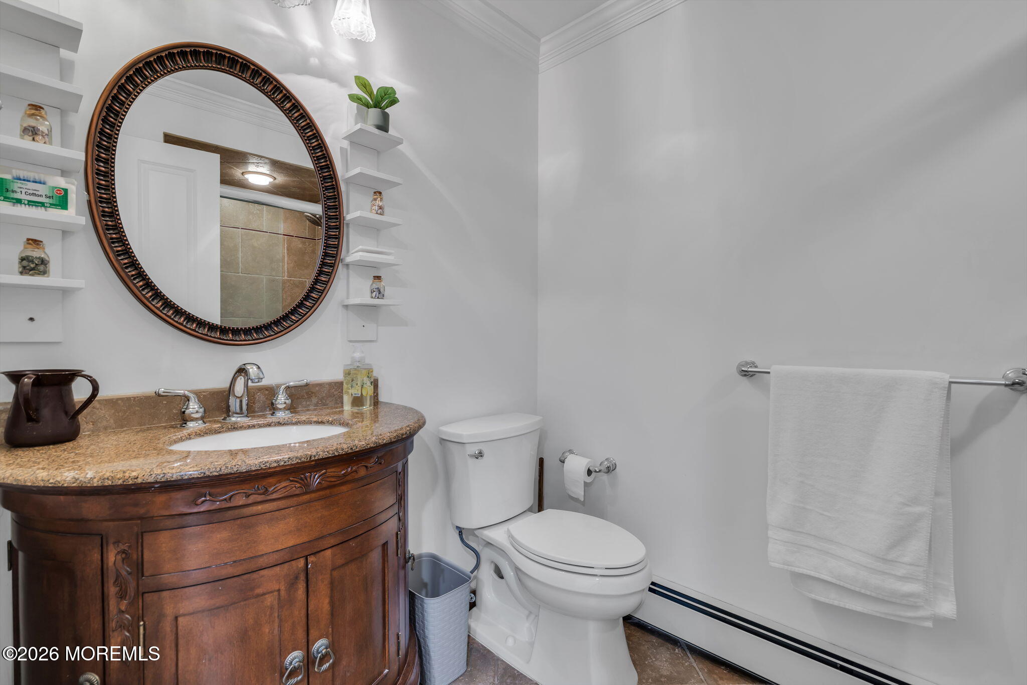 1731 Silverton Road Toms River, NJ 08753 - Photo 28 of 46 a bathroom with a sink a toilet and a mirror