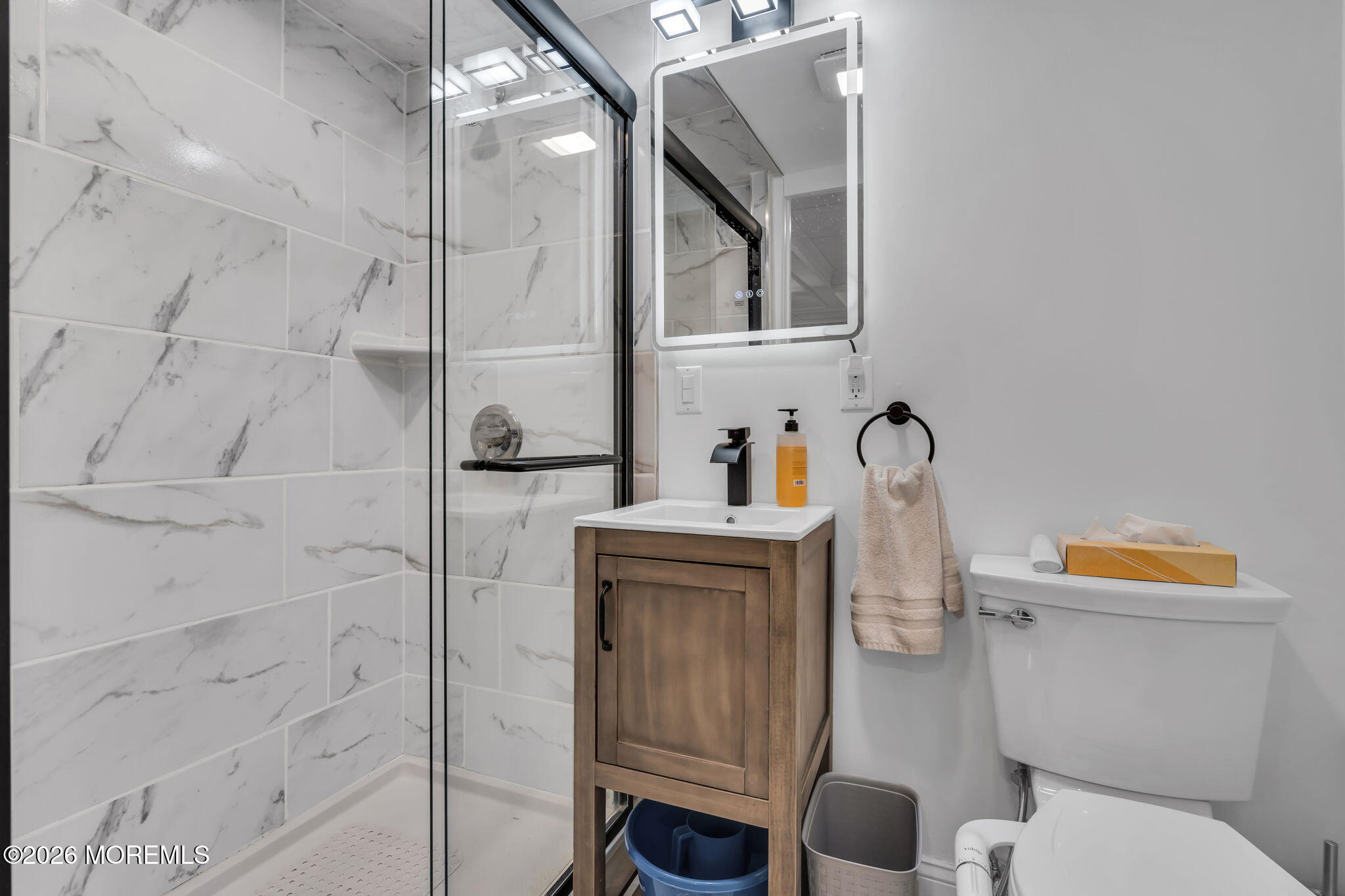 1731 Silverton Road Toms River, NJ 08753 - Photo 30 of 46 a bathroom with a sink toilet and shower