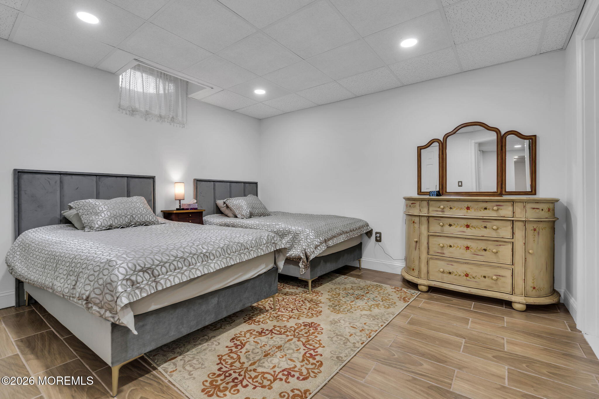 1731 Silverton Road Toms River, NJ 08753 - Photo 36 of 46 a bedroom with a bed and a dresser