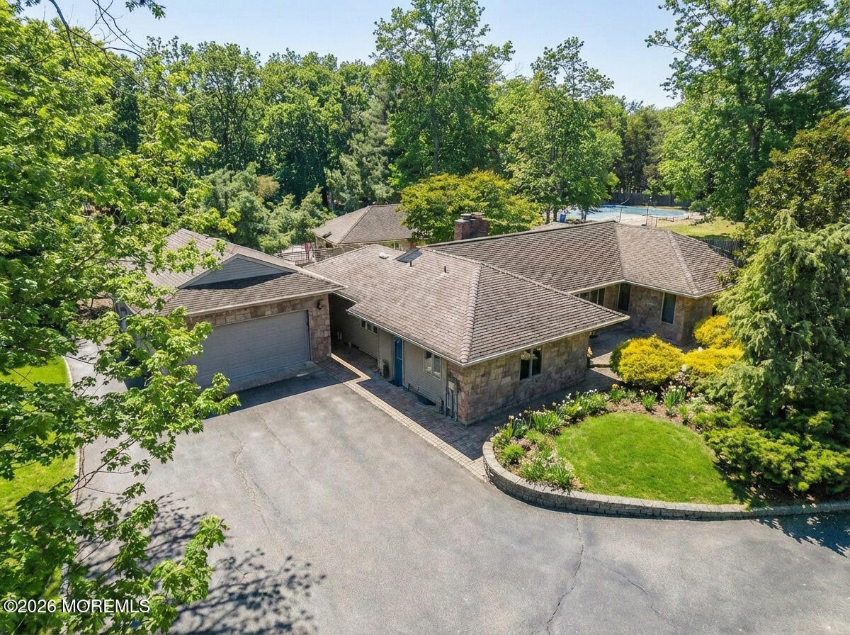 1731 Silverton Road Toms River, NJ 08753 - Photo 7 of 46 an aerial view of a house with a yard and large trees