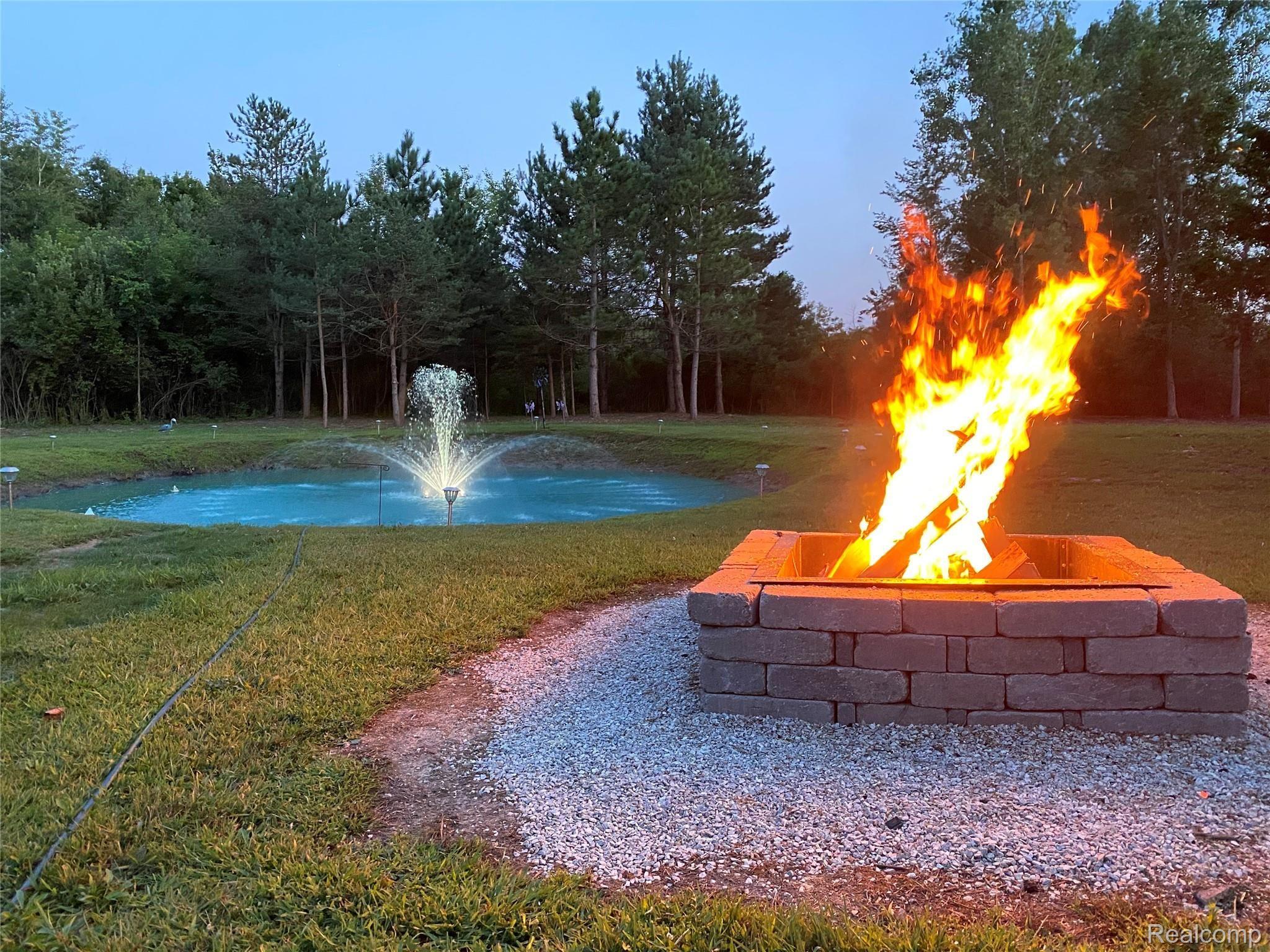 Beautiful Pond with Fountain & Firepit! Great Trails for ORV Riding!