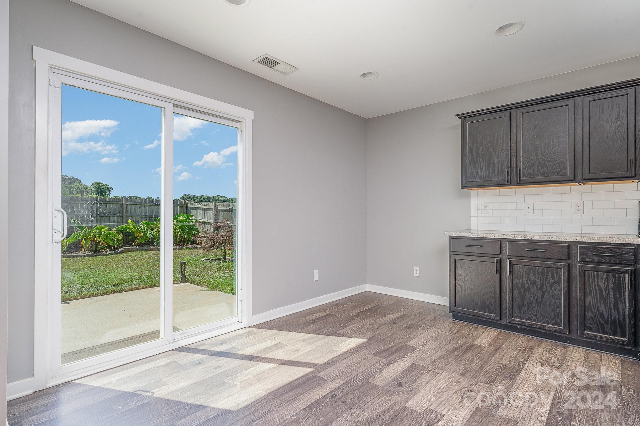 4602 Gibbons Link Road Charlotte, NC 28269 - Photo 11 of 35 a view of a kitchen with a sink and a window