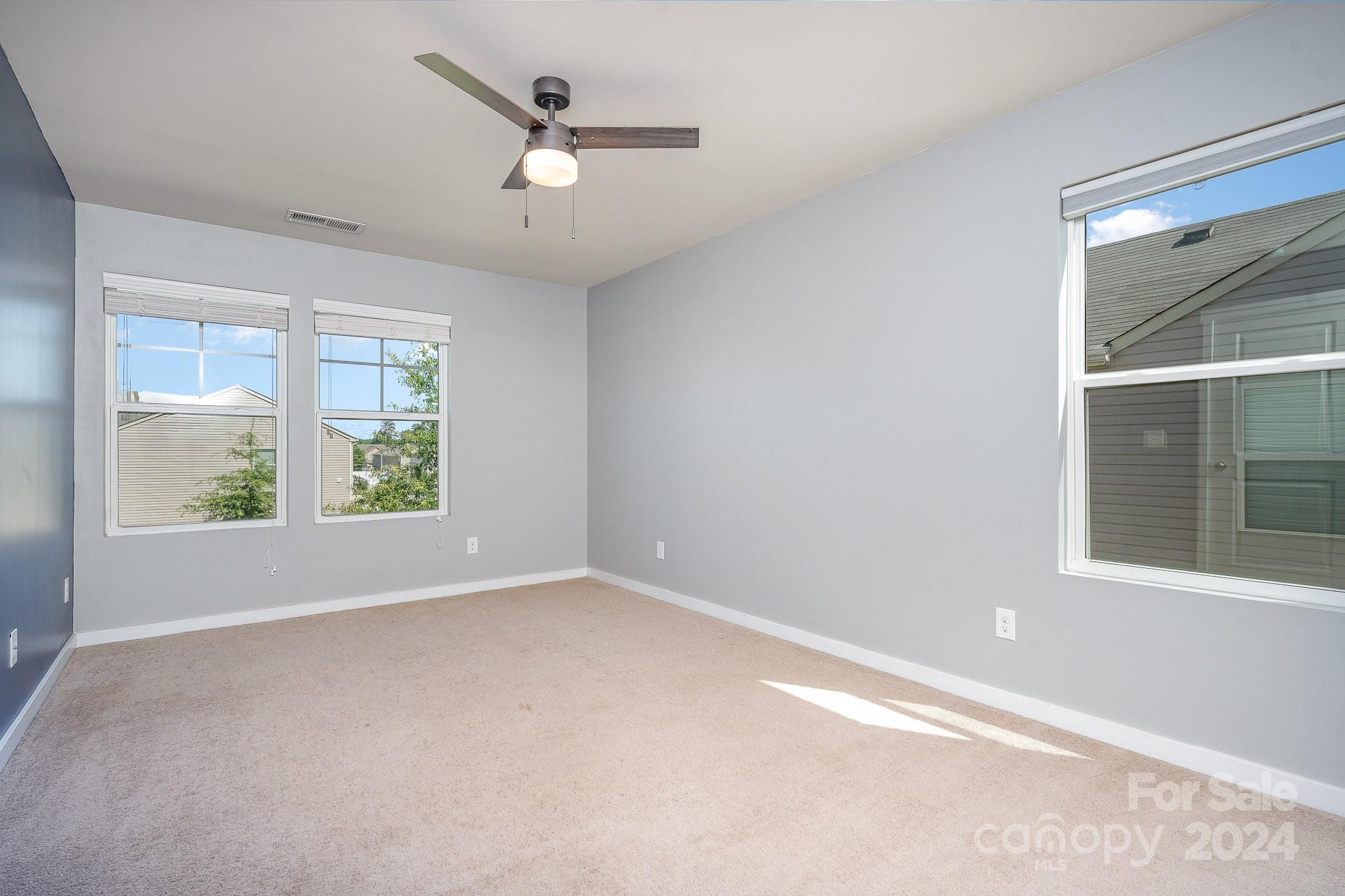 4602 Gibbons Link Road Charlotte, NC 28269 - Photo 25 of 35 an empty room with a window