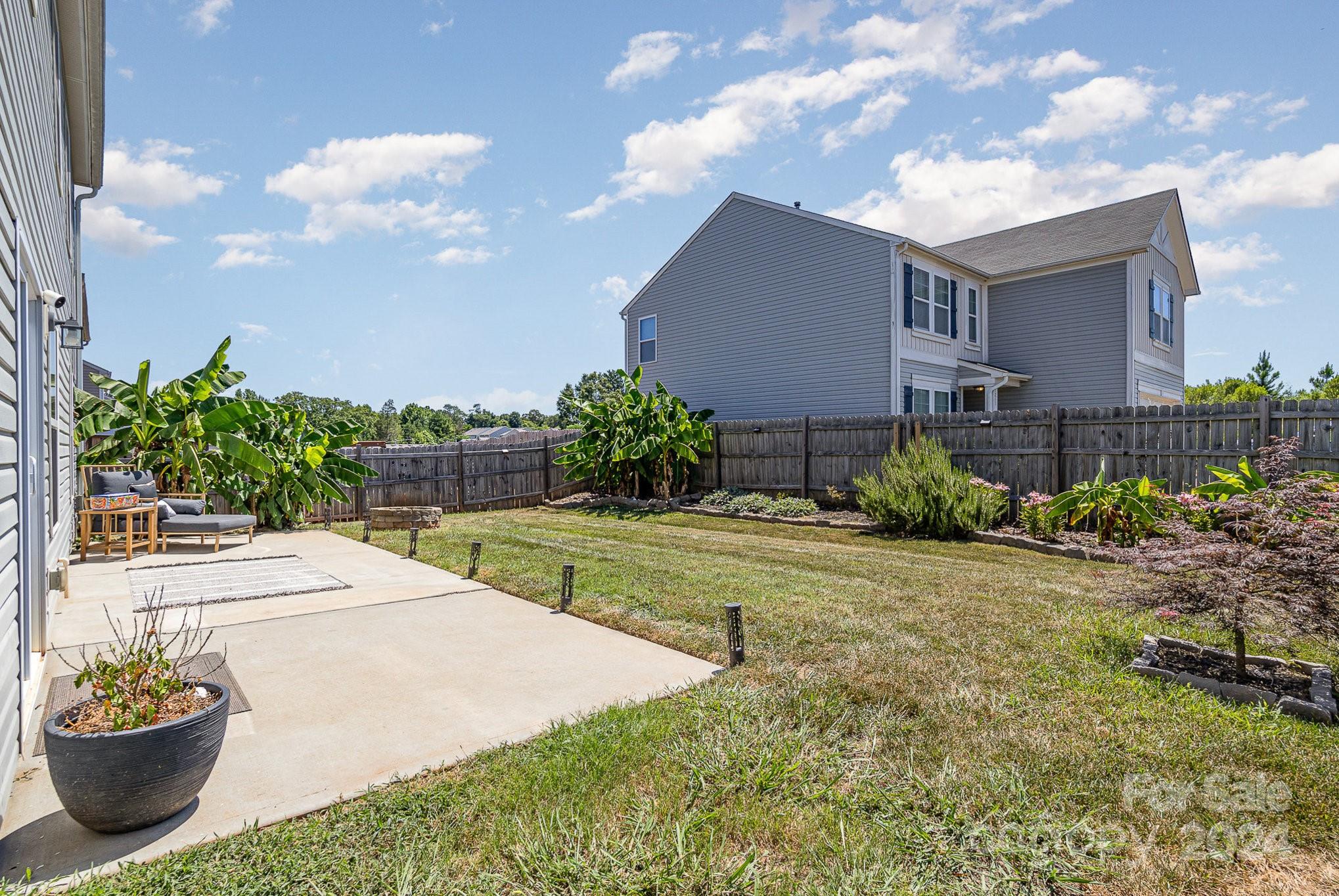 4602 Gibbons Link Road Charlotte, NC 28269 - Photo 32 of 35 a view of a backyard of the house