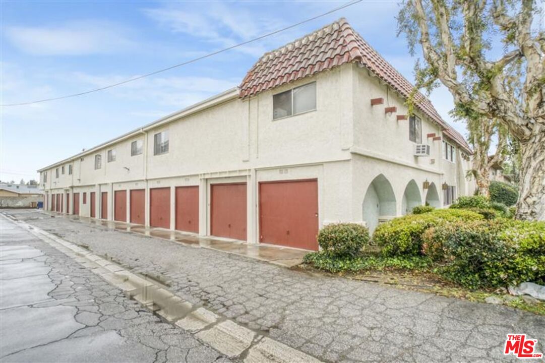 7356 Corbin Avenue Reseda, CA 91335 - Photo 3 of 11 a view of a house with a yard