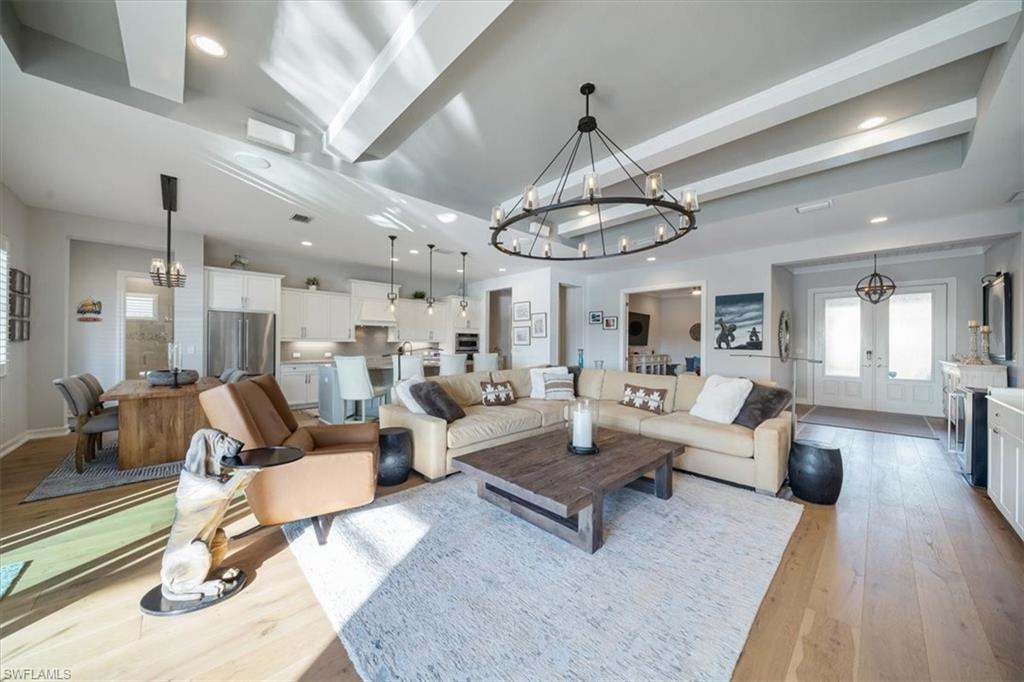 14372 Neptune Avenue Naples, FL 34114 - Photo 14 of 49 Tray ceiling with beam accents