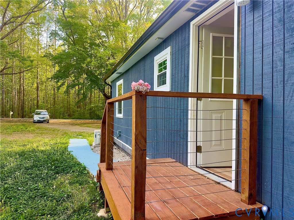 3829 Five Forks Road Pamplin, VA 23958 - Photo 14 of 65 a front view of a house with garden