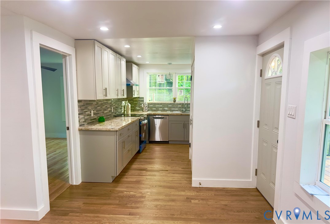 3829 Five Forks Road Pamplin, VA 23958 - Photo 22 of 65 a kitchen with a stove a refrigerator and a sink