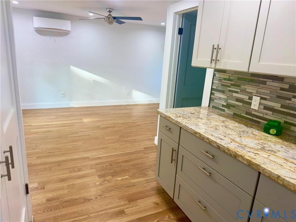 3829 Five Forks Road Pamplin, VA 23958 - Photo 29 of 65 a bathroom with a granite countertop sink and a mirror