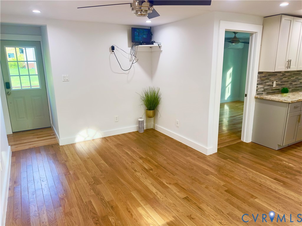 3829 Five Forks Road Pamplin, VA 23958 - Photo 31 of 65 a view of empty room with wooden floor and fan