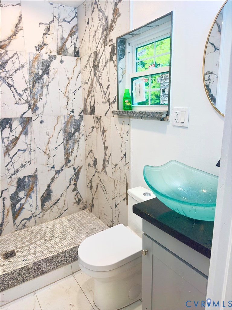 3829 Five Forks Road Pamplin, VA 23958 - Photo 37 of 65 a bathroom with a toilet and a sink