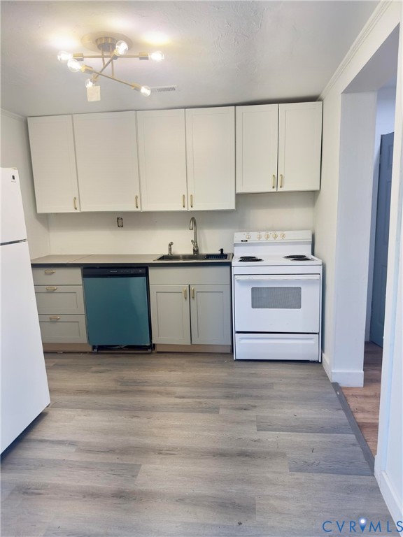 3829 Five Forks Road Pamplin, VA 23958 - Photo 54 of 65 a kitchen with a cabinets and white appliances