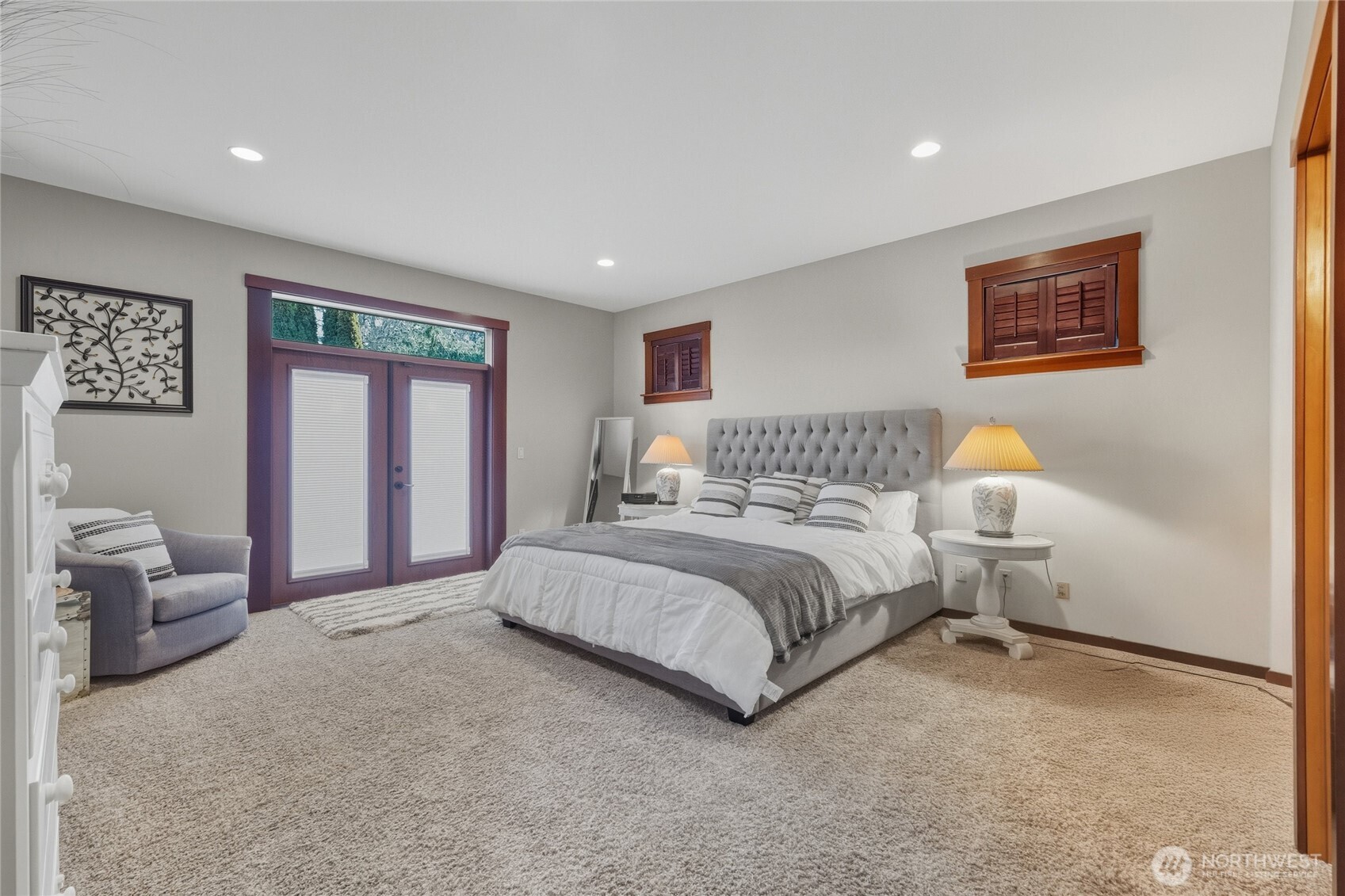 8424 Double Ditch Road Lynden, WA 98264 - Photo 17 of 39 a spacious bedroom with a bed and a couch