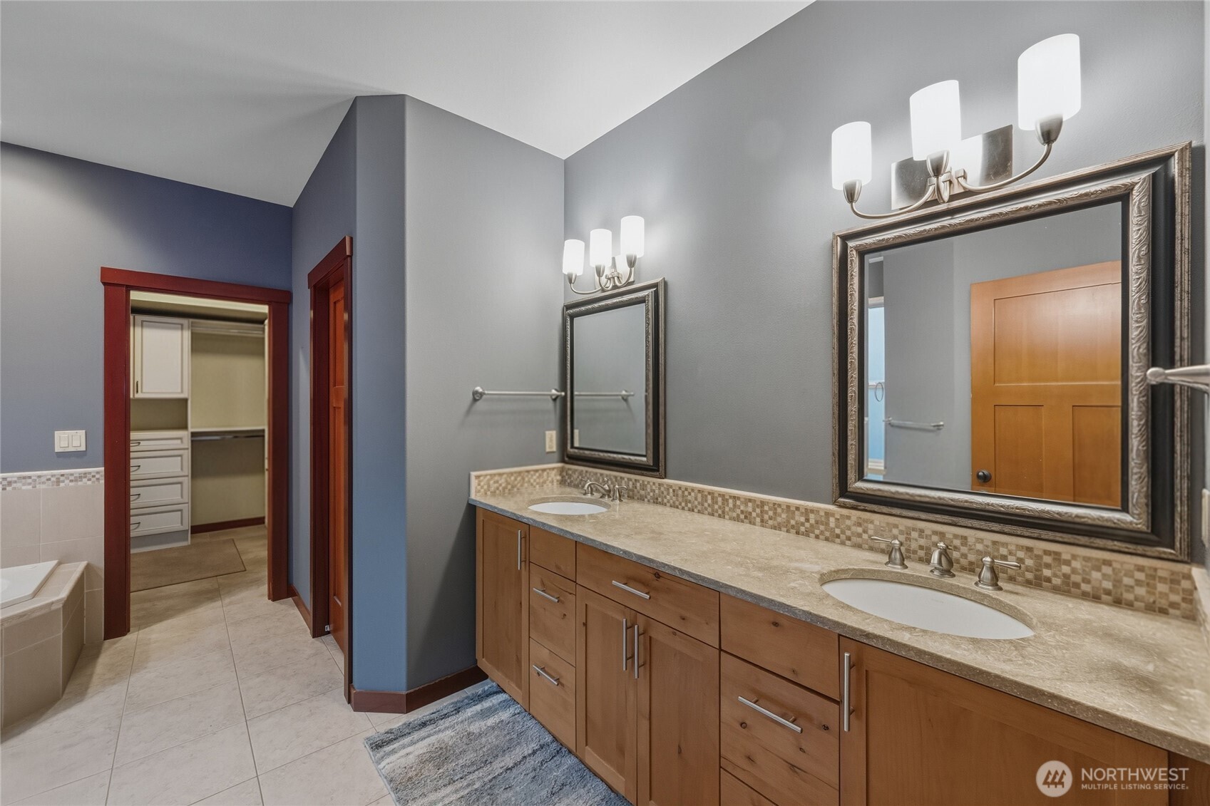 8424 Double Ditch Road Lynden, WA 98264 - Photo 20 of 39 a bathroom with double sink and two mirror