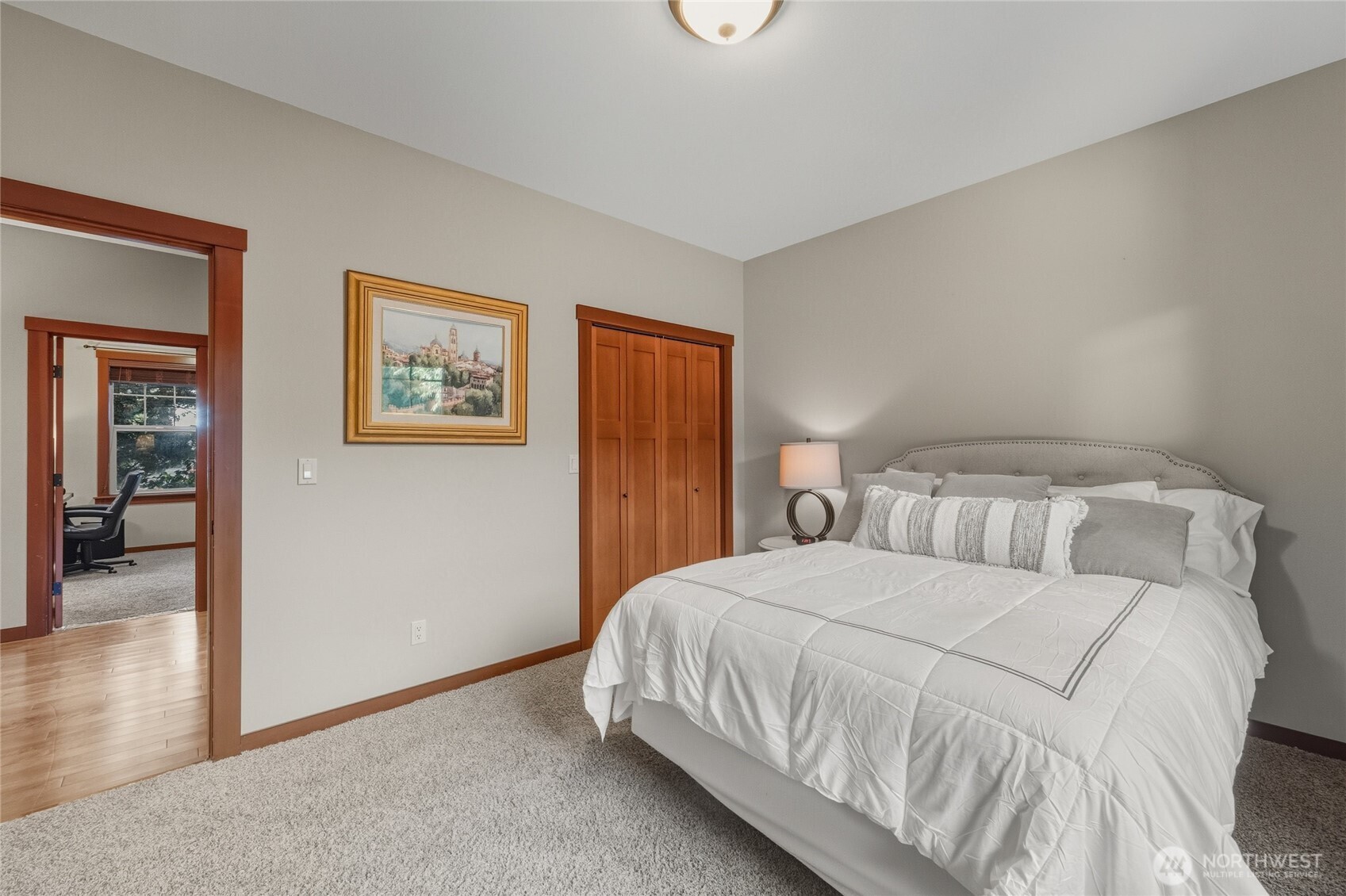 8424 Double Ditch Road Lynden, WA 98264 - Photo 25 of 39 a bedroom with a bed and a painting on the wall