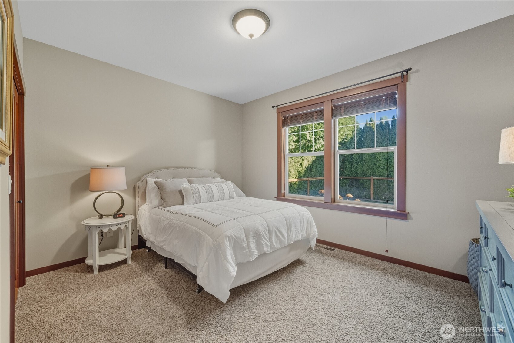 8424 Double Ditch Road Lynden, WA 98264 - Photo 26 of 39 a spacious bedroom with a bed and window