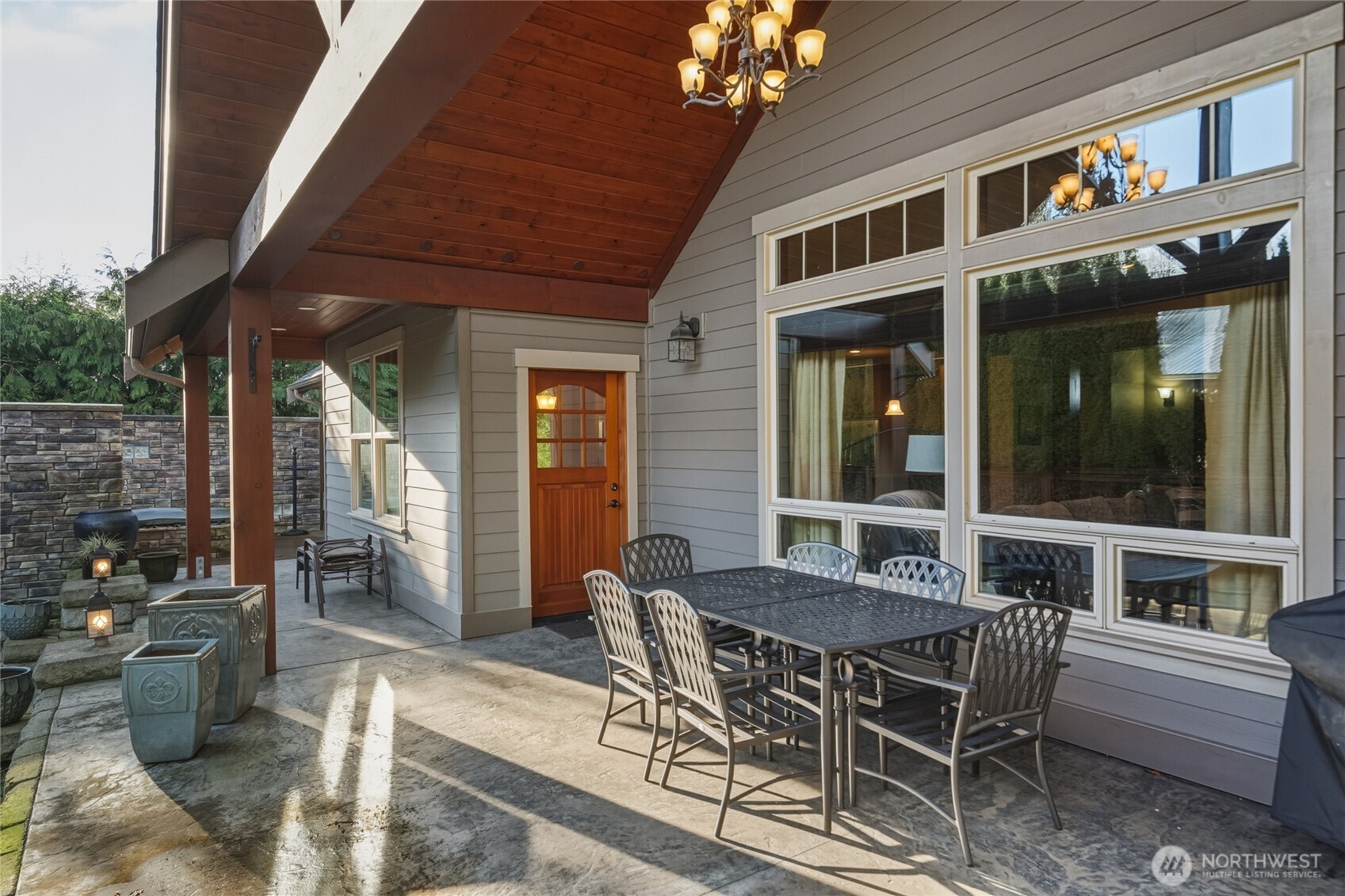 8424 Double Ditch Road Lynden, WA 98264 - Photo 32 of 39 a view of a dining room with furniture a chandelier and wooden floor