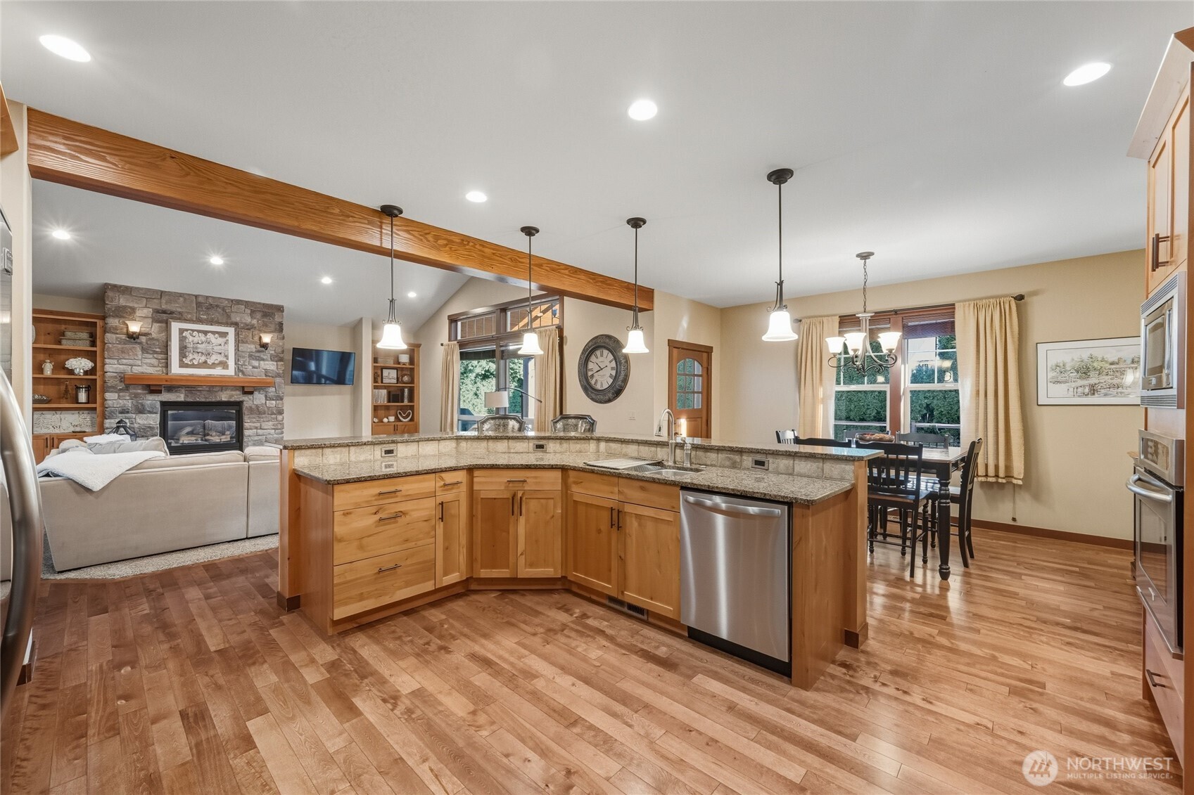8424 Double Ditch Road Lynden, WA 98264 - Photo 8 of 39 a kitchen with stainless steel appliances granite countertop a stove and a wooden floors