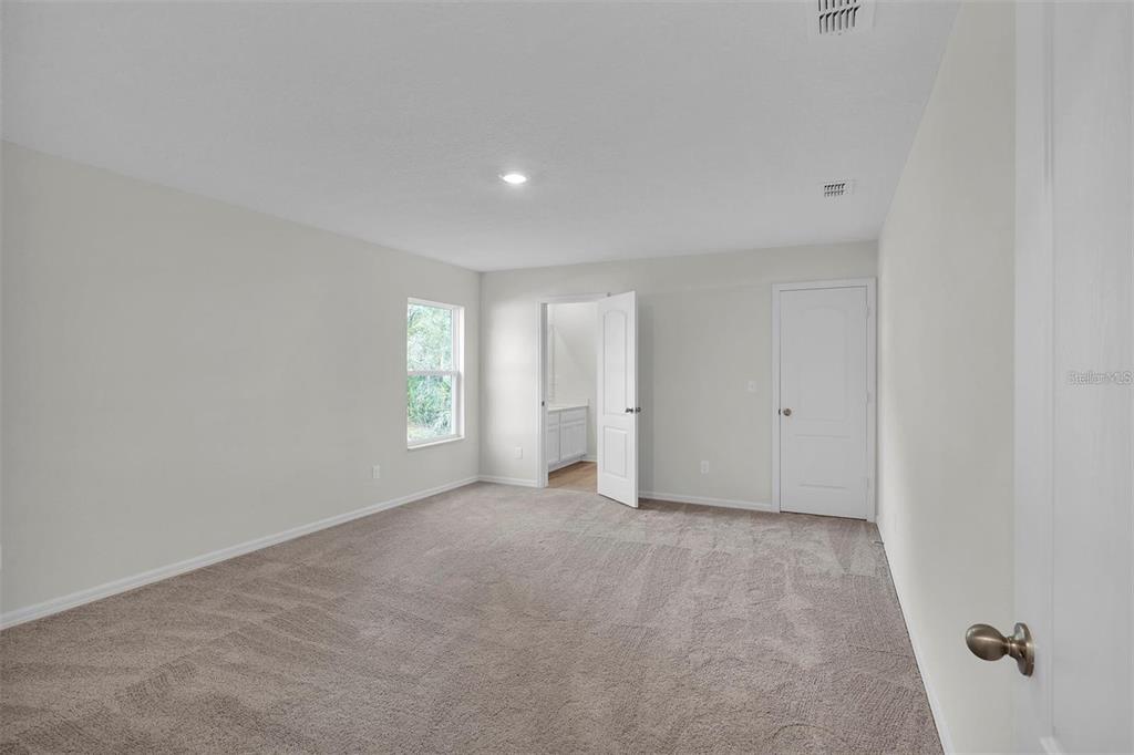 2 Prince Eric Lane Palm Coast, FL 32164 - Photo 12 of 24 a view of an empty room with a window