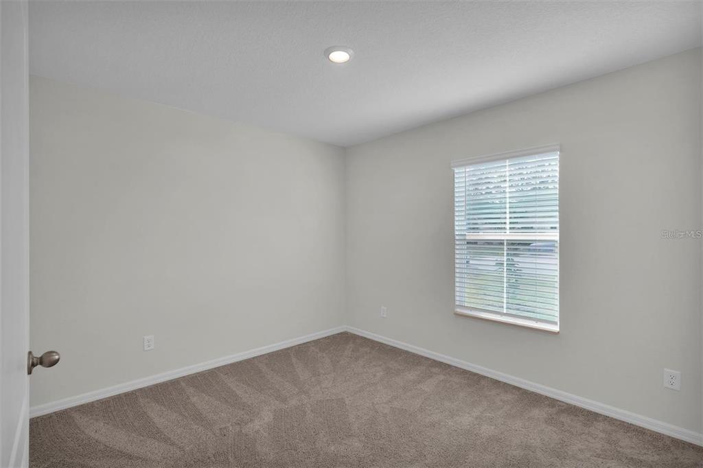 2 Prince Eric Lane Palm Coast, FL 32164 - Photo 14 of 24 an empty room with windows