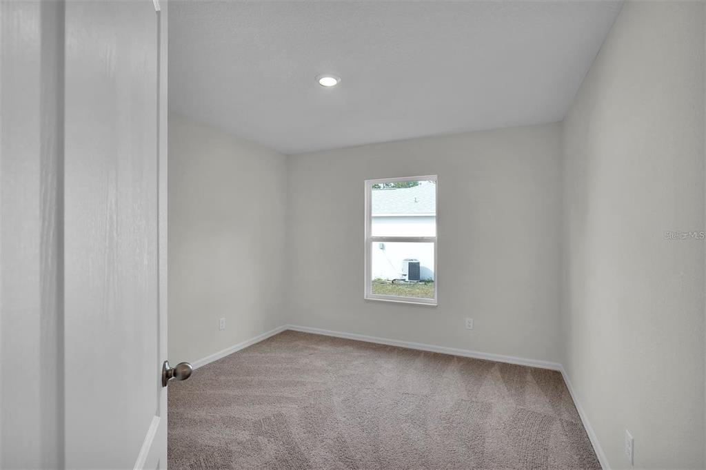 2 Prince Eric Lane Palm Coast, FL 32164 - Photo 15 of 24 an empty room with a window