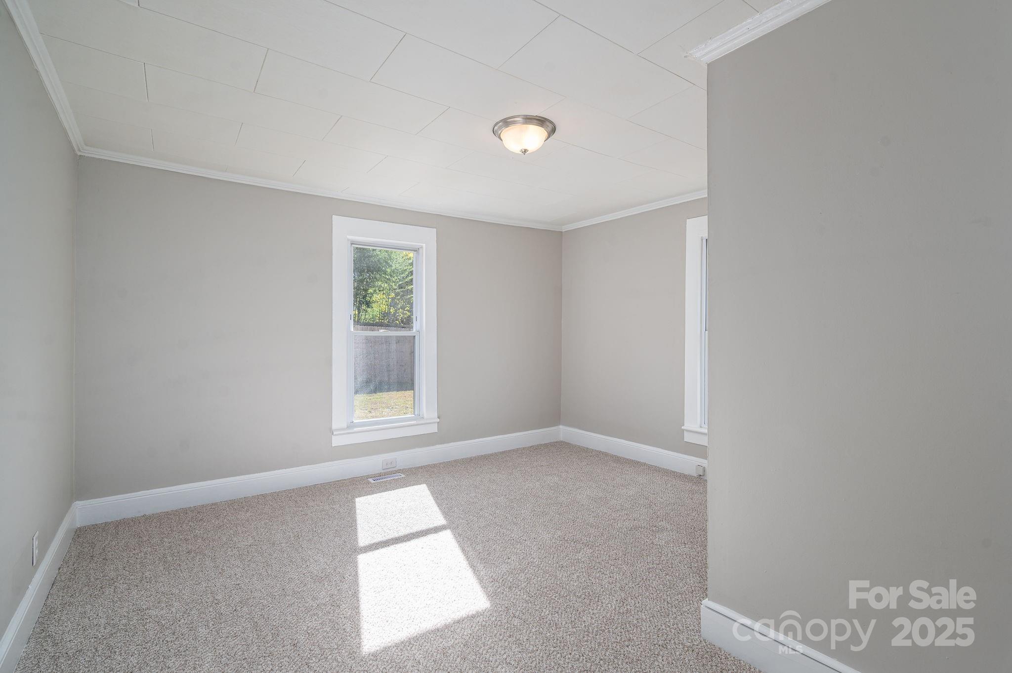 1811 Hemlock Avenue Gastonia, NC 28054 - Photo 16 of 31 a view of an empty room with a window