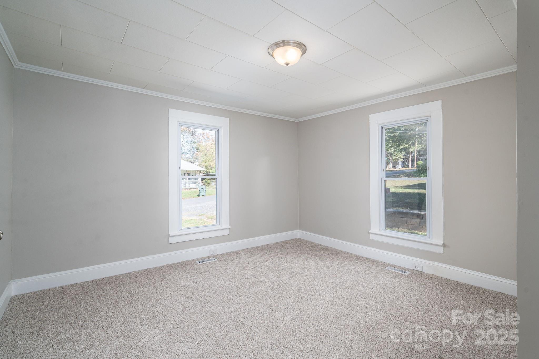 1811 Hemlock Avenue Gastonia, NC 28054 - Photo 18 of 31 an empty room with a window