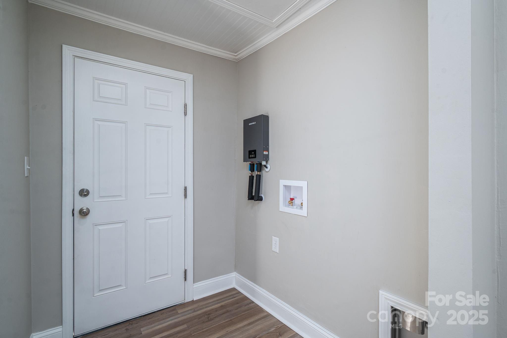 1811 Hemlock Avenue Gastonia, NC 28054 - Photo 23 of 31 a view of a hallway with wooden floor
