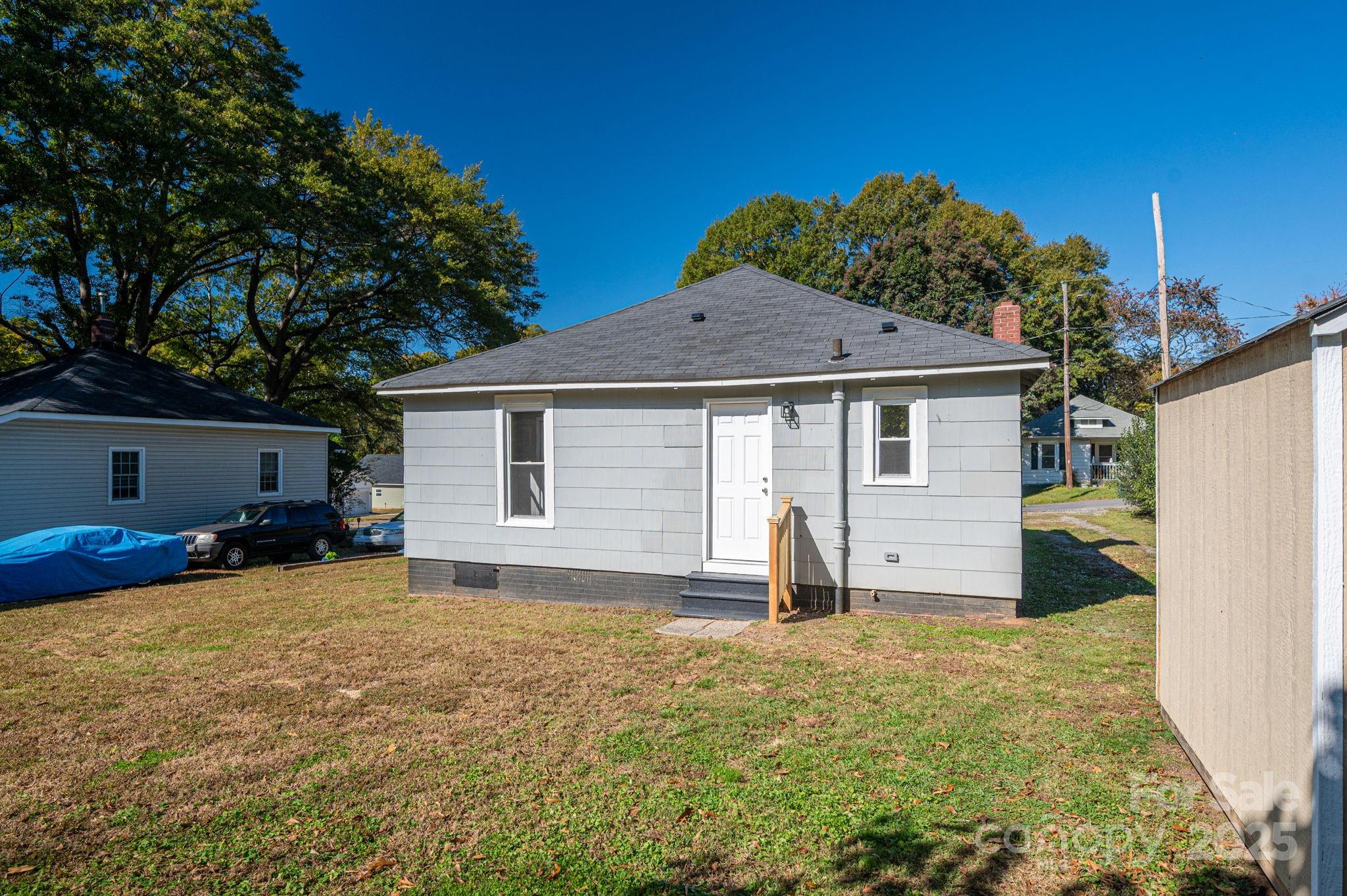 1811 Hemlock Avenue Gastonia, NC 28054 - Photo 24 of 31 a house view with a garden space