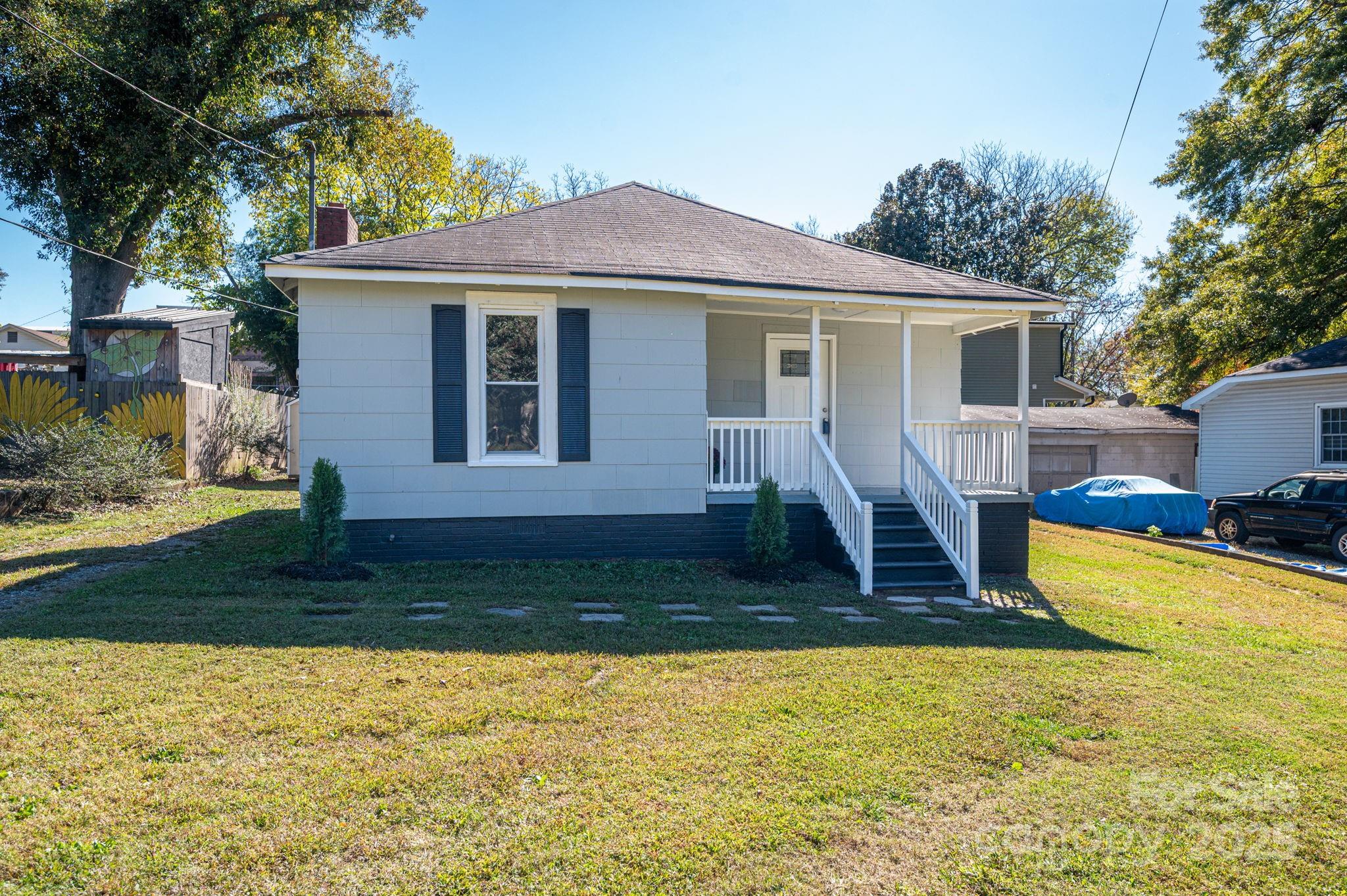 1811 Hemlock Avenue Gastonia, NC 28054 - Photo 3 of 31 a view of a house with backyard and sitting area