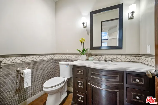 a bathroom with a sink and a toilet