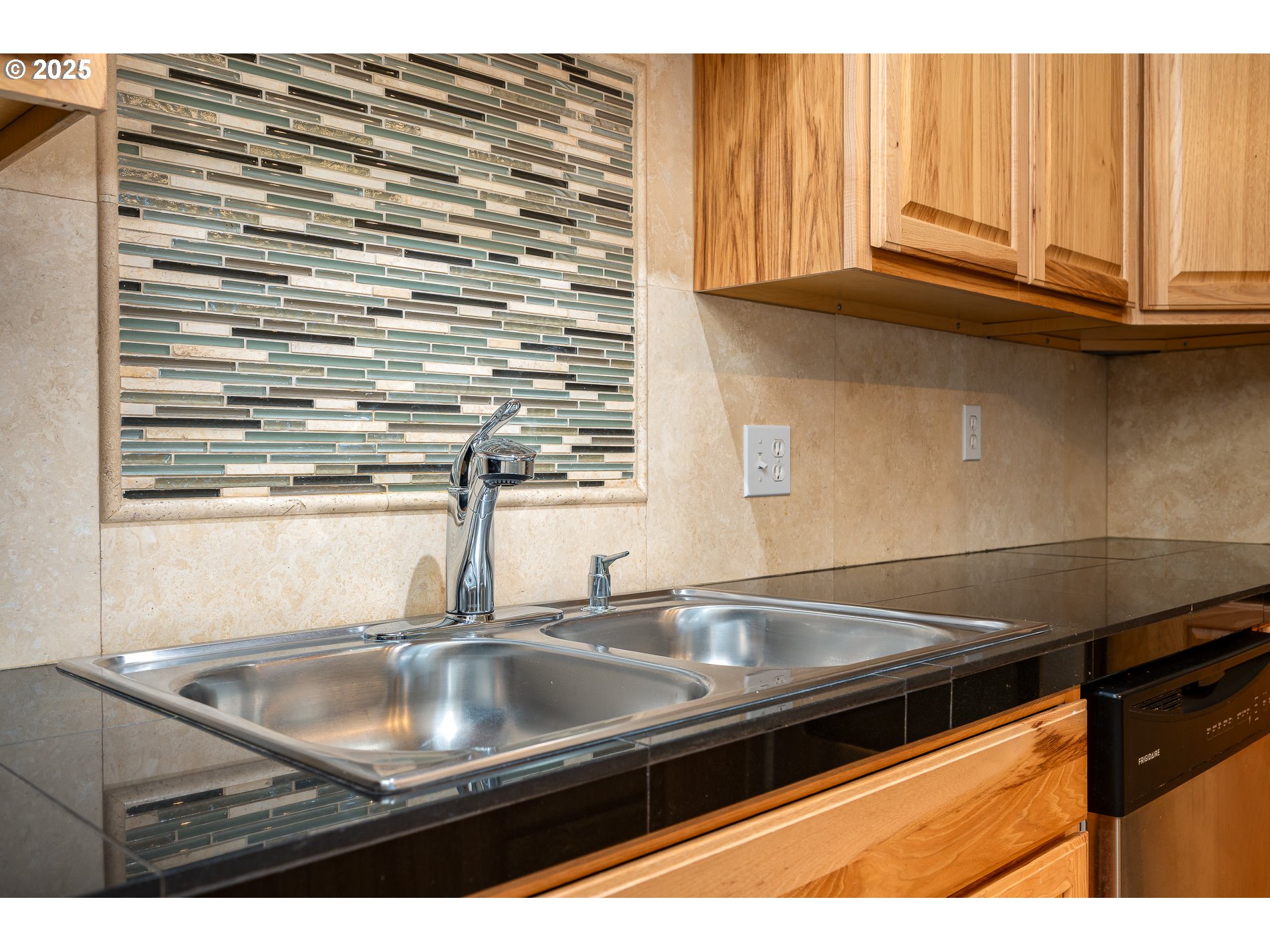 10090 Southwest Beaverton Hillsdale Highway, Unit 16 Beaverton, OR 97005 - Photo 13 of 39 a kitchen with a sink and cabinets