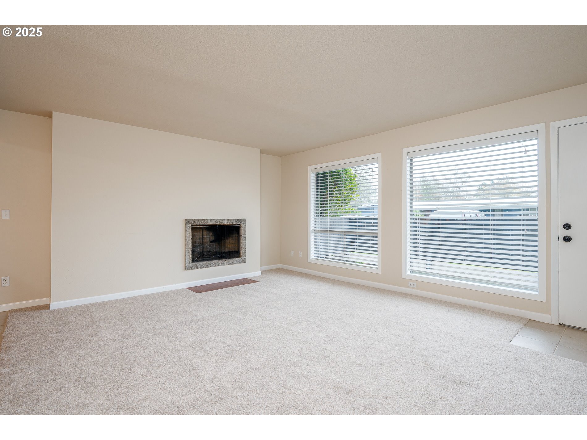 10090 Southwest Beaverton Hillsdale Highway, Unit 16 Beaverton, OR 97005 - Photo 16 of 39 a view of an empty room with a window