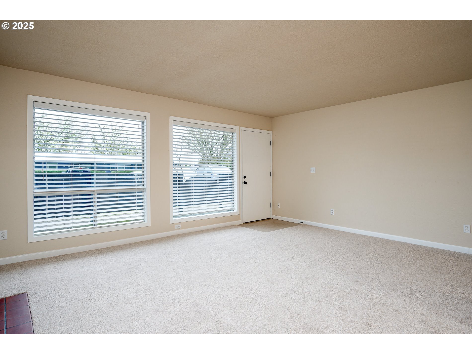 10090 Southwest Beaverton Hillsdale Highway, Unit 16 Beaverton, OR 97005 - Photo 19 of 39 a view of an empty room with a window