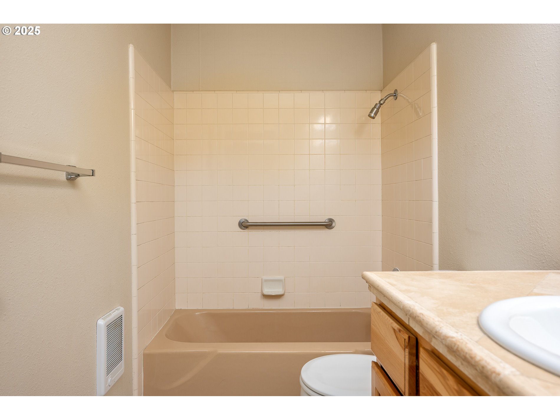 10090 Southwest Beaverton Hillsdale Highway, Unit 16 Beaverton, OR 97005 - Photo 30 of 39 a bathroom with a bathtub and a shower