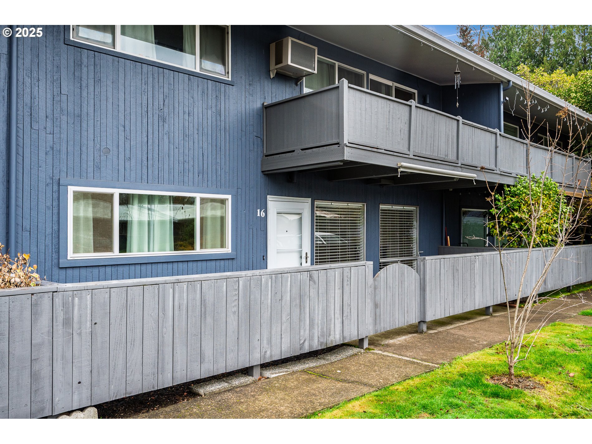 10090 Southwest Beaverton Hillsdale Highway, Unit 16 Beaverton, OR 97005 - Photo 38 of 39 a view of a house with a backyard space