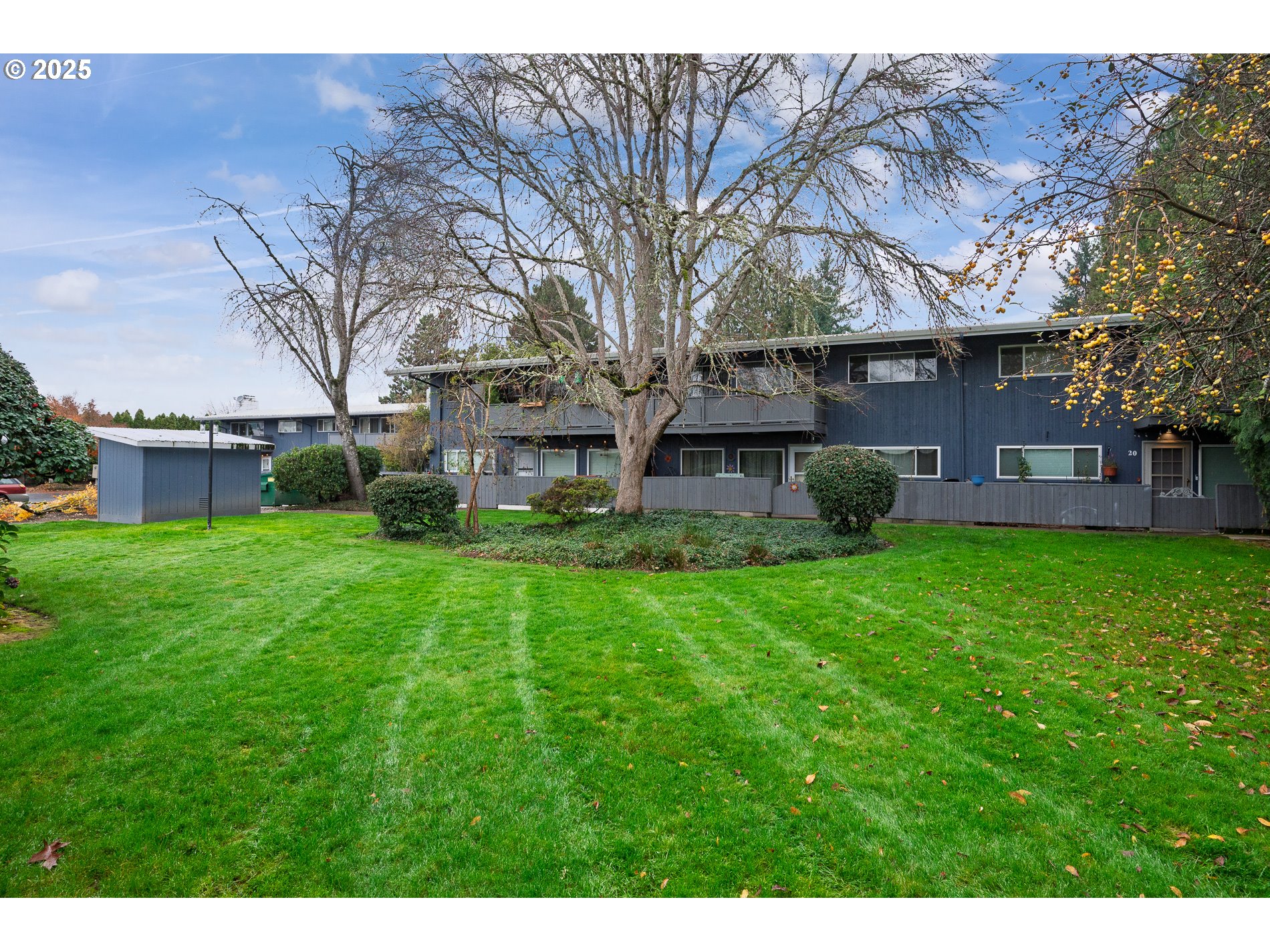 10090 Southwest Beaverton Hillsdale Highway, Unit 16 Beaverton, OR 97005 - Photo 8 of 39 a view of a house with a back yard