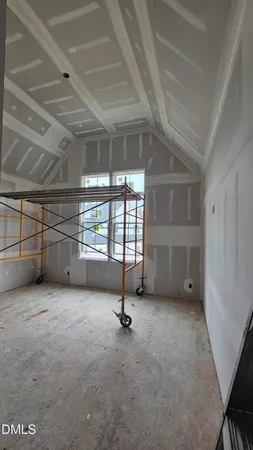a view of a livingroom with furniture and closet