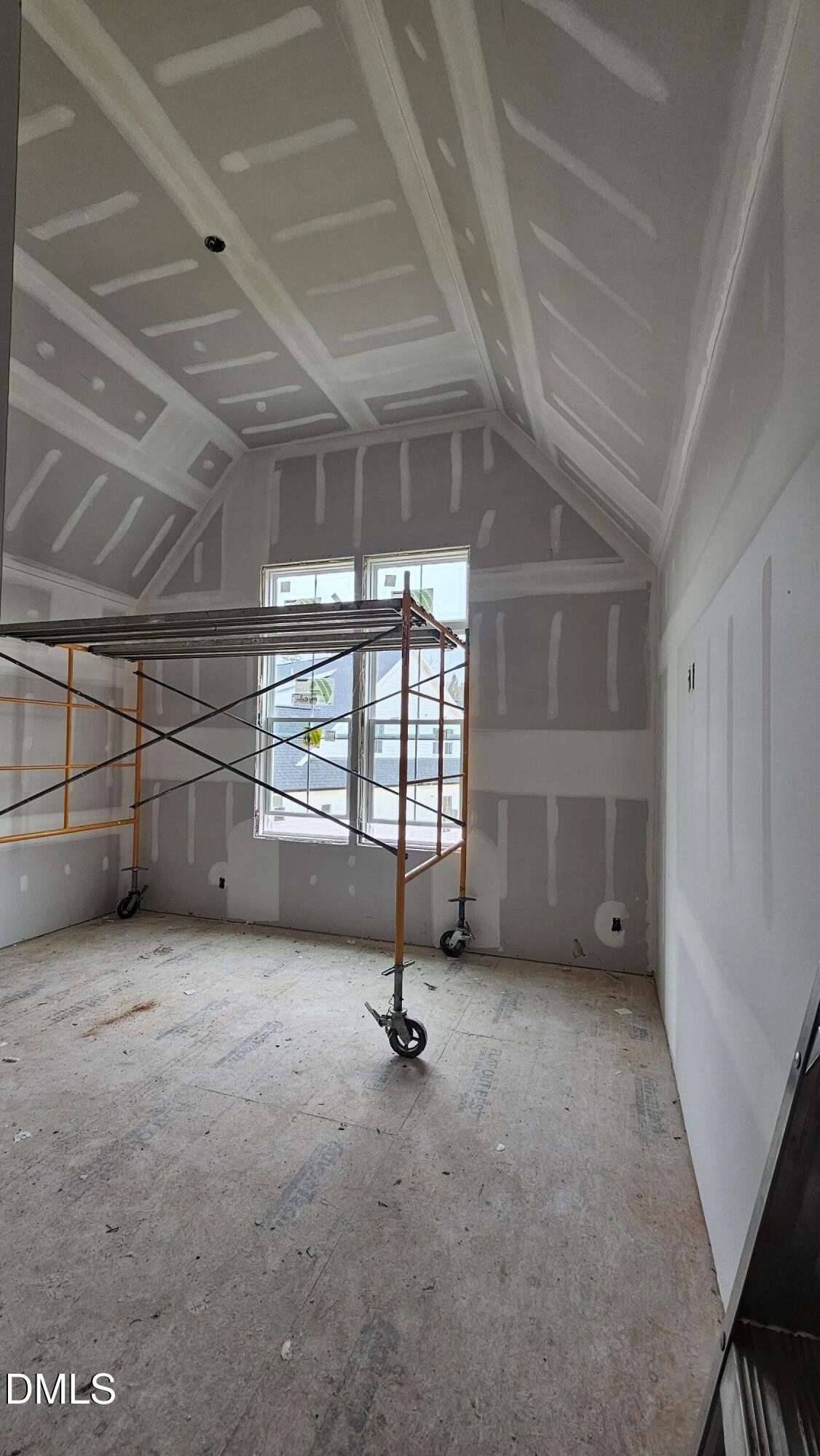 729 Bennett Ridge Court Wake Forest, NC 27587 - Photo 5 of 11 a view of an empty room with a window