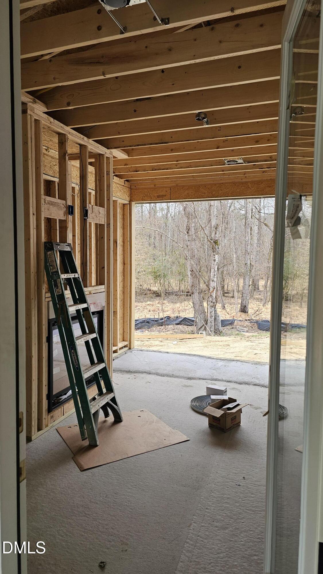 729 Bennett Ridge Court Wake Forest, NC 27587 - Photo 8 of 11 a room with gym equipment and a large window