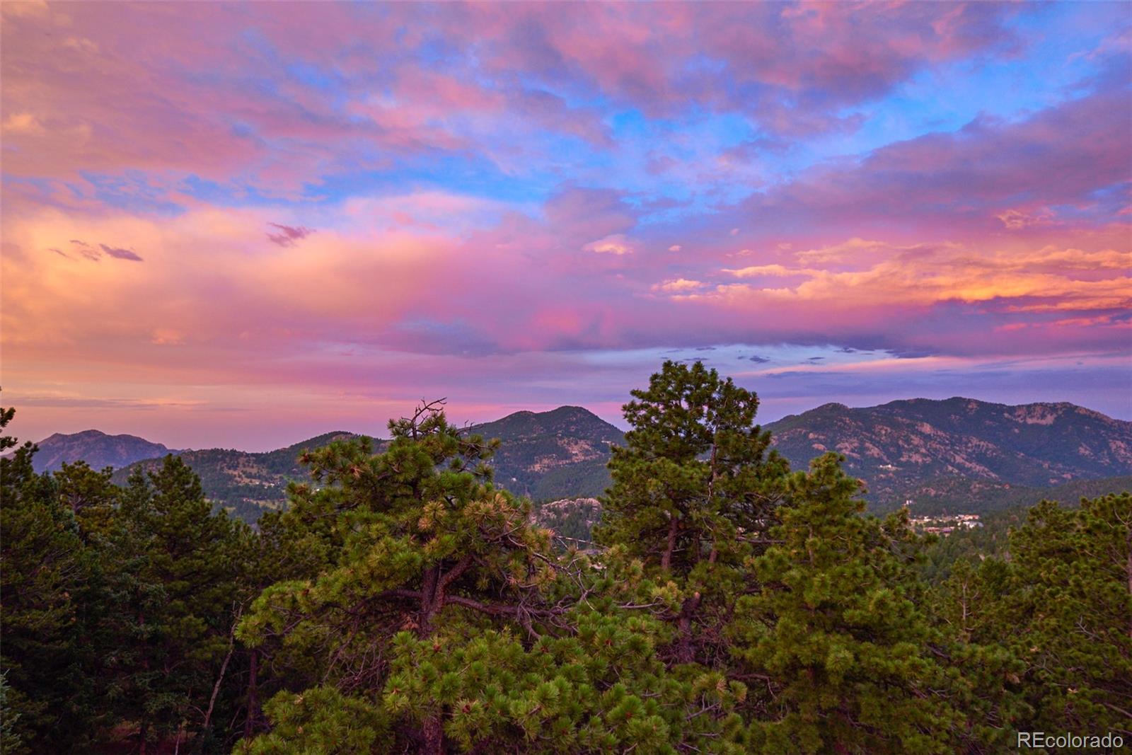 11440 Inspiration Road Golden, CO 80403 - Photo 4 of 38 a view of a city with sunset
