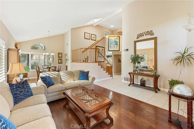 a living room with furniture and a table