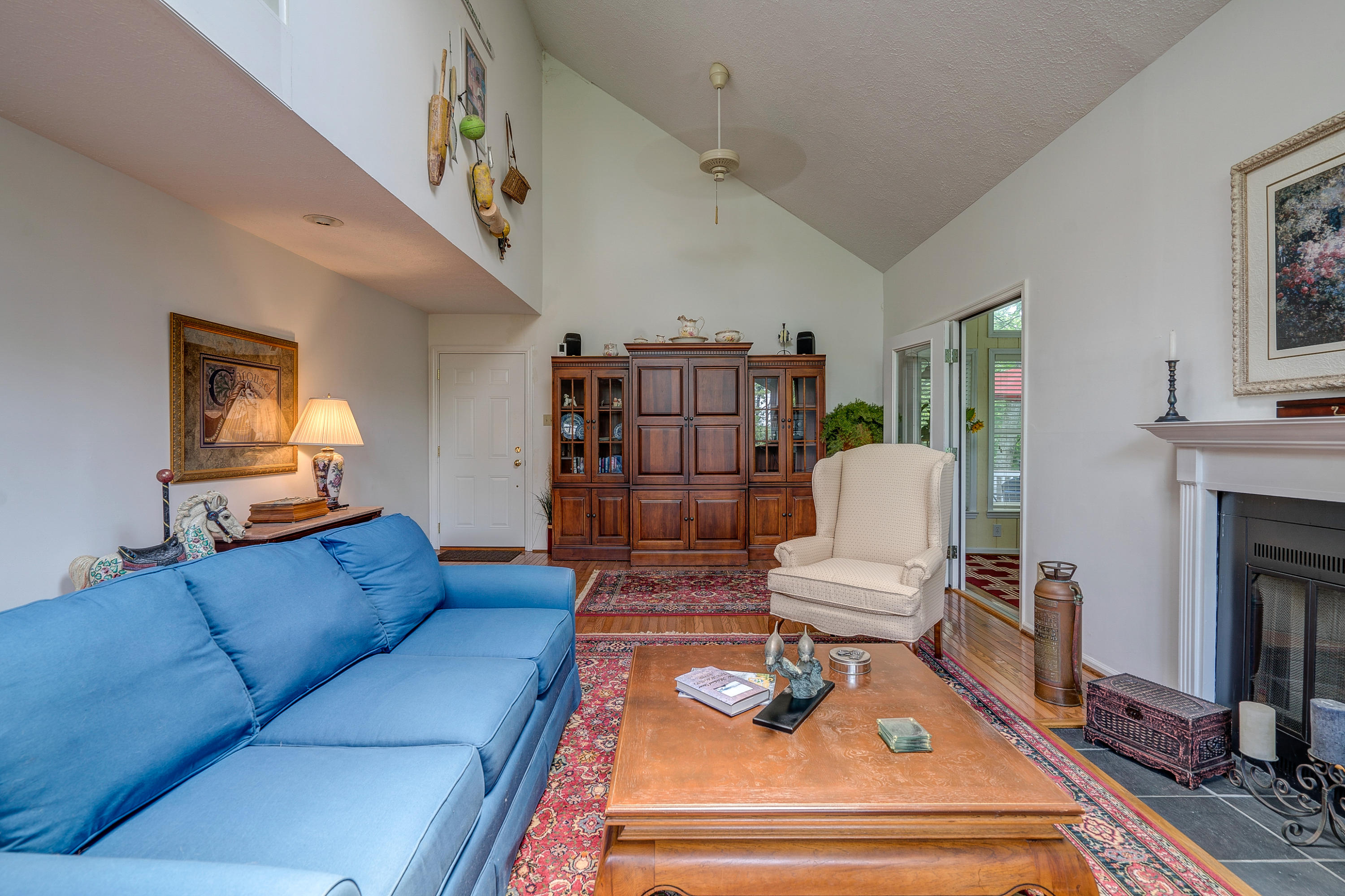 161 Highland Lake Road Union Hall, VA 24176 - Photo 12 of 45 a living room with furniture or couch and a fireplace
